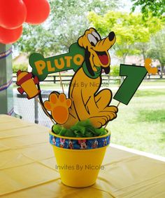 Pluto temática de fiesta infantil centro de mesa